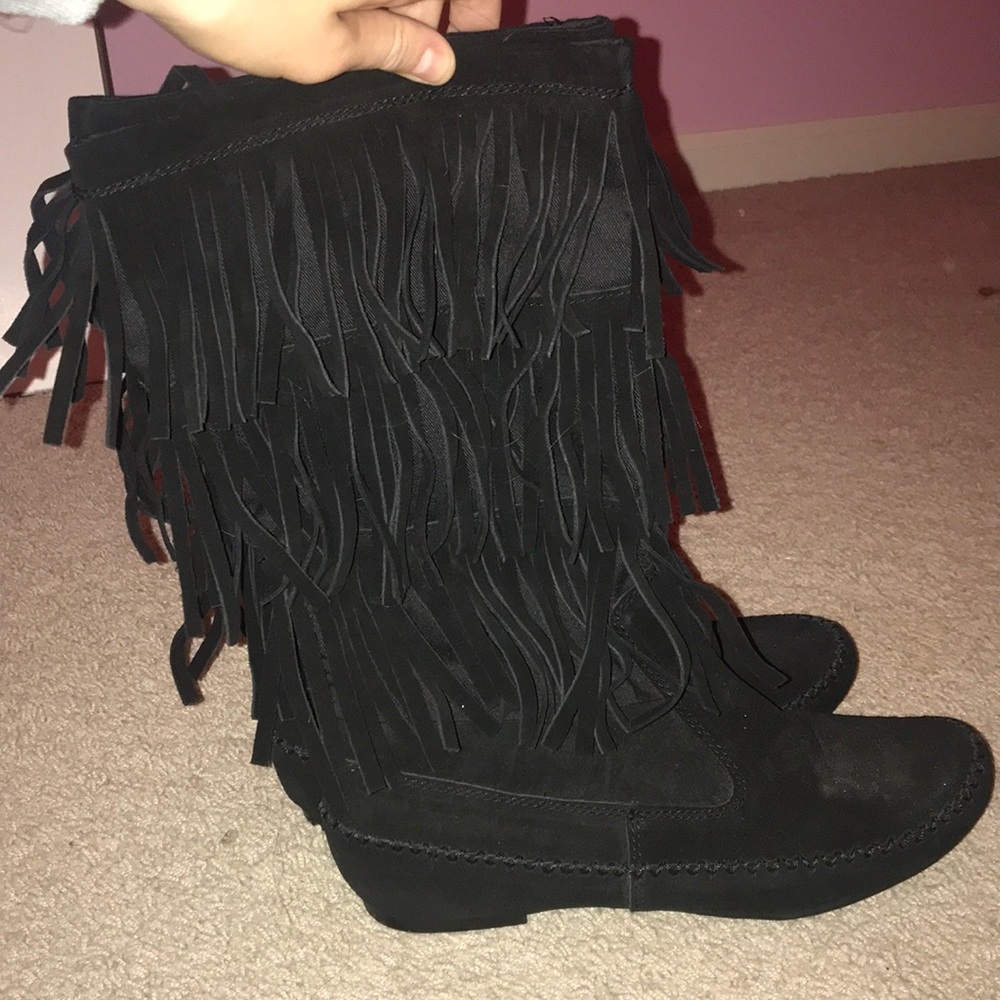 Black boots with fringe